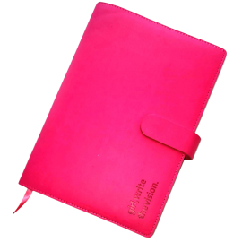 A leather case for the 'Girl, Write the Vision' journal, featuring the journal's title debossed into the leather.